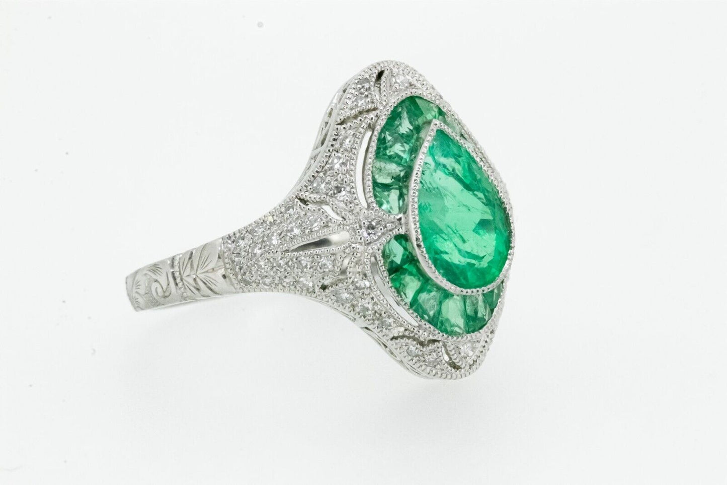 Art Deco Inspired Pear Cut Emerald Platinum Diamond Ring