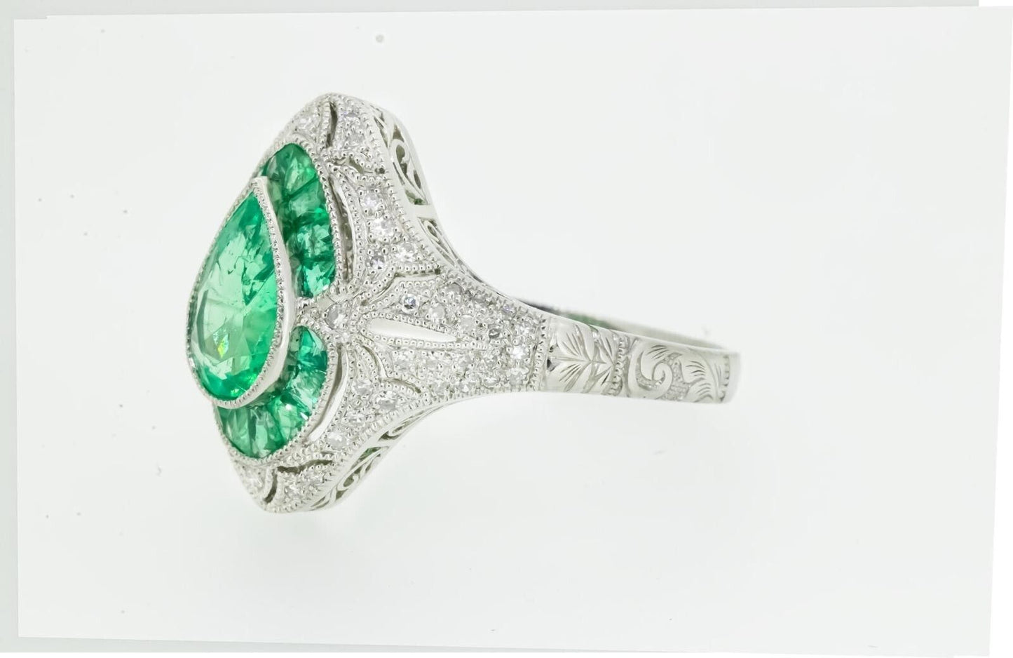 Art Deco Inspired Pear Cut Emerald Platinum Diamond Ring